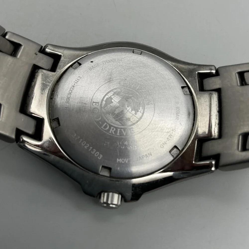 Citizen Eco-Drive Titanium Mens Watch 40mm Black Dial WR 100 E111-K006368 7.25